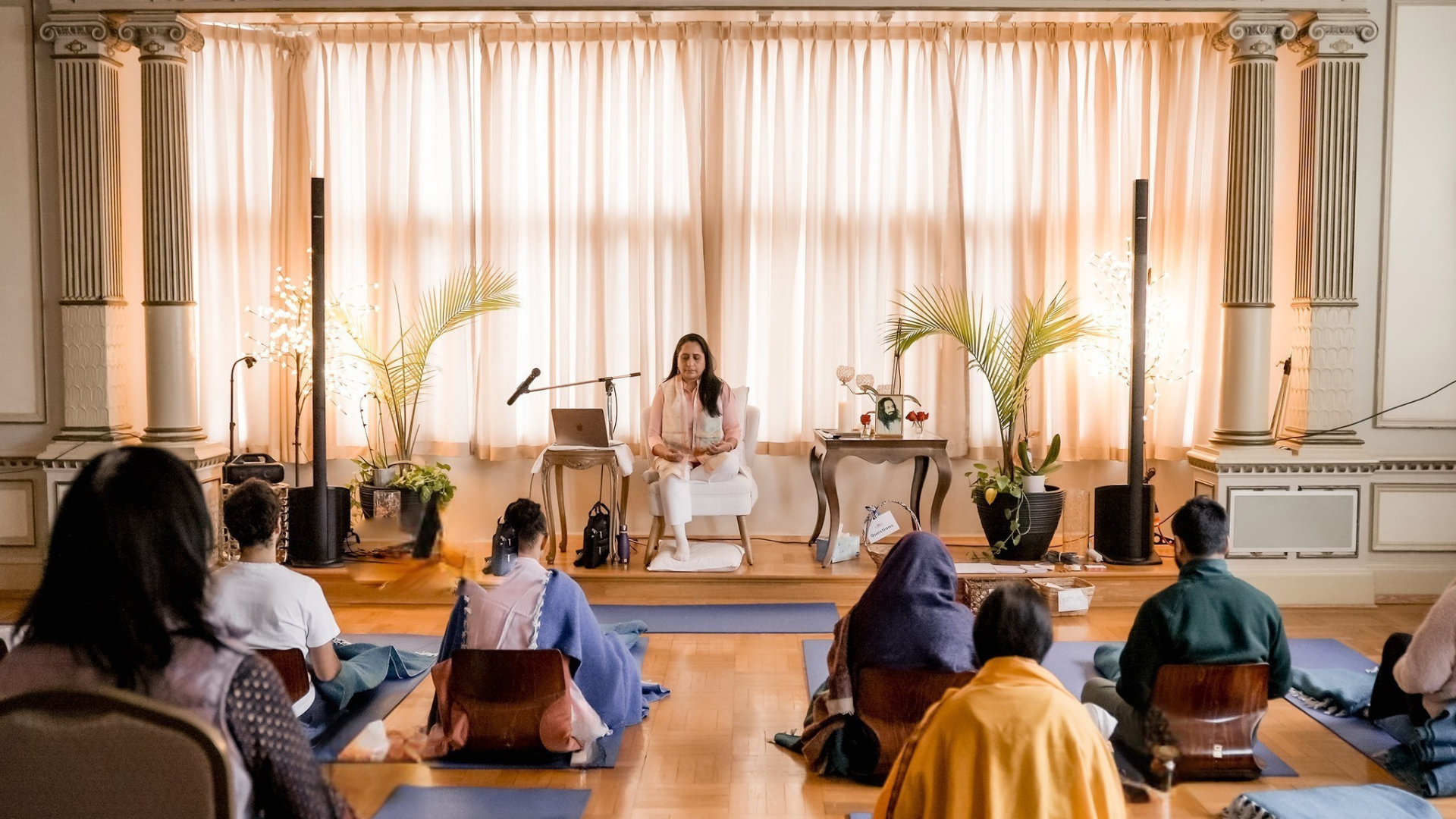 Shobha leading a meditation session